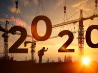 Silhouette construction site,Cranes building construction 2020 year sign Silhouette construction site,Cranes building construction 2020 year sign